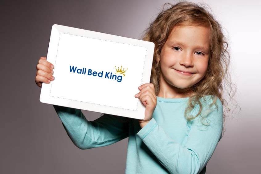 Girl holding up a tablet with Wall Bed King Reviews
